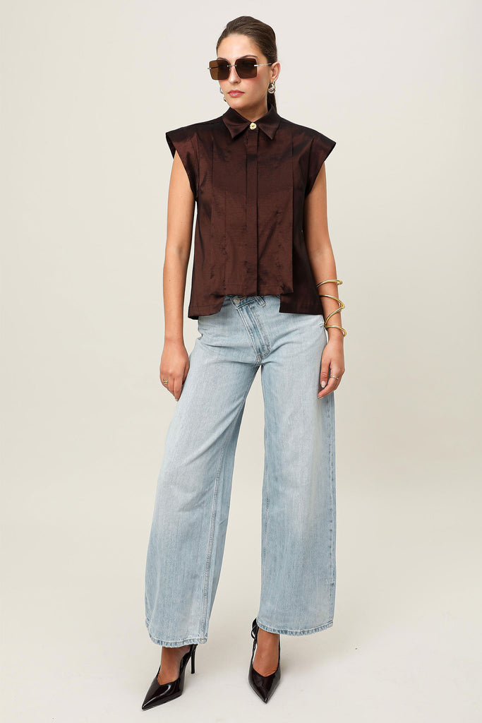 Front e-commerce image of the Realm Origin Sol Verite Top in mocha brown, structured sleeveless taffeta shirt with front flange pleats, concealed button placket, shoulder pads and step hem.