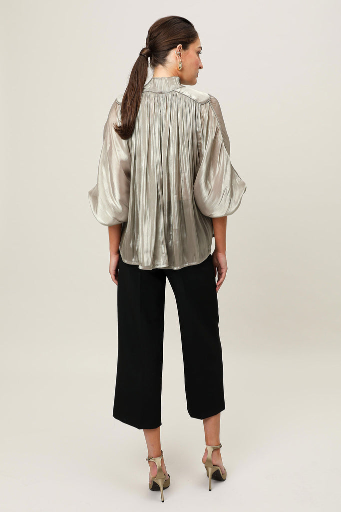 Back view of the Realm Origin Atelier Bow Top in semi-sheer Japanese satin, featuring gathered back bodice, shoulder panel piping and voluminous 3/4 sleeves.